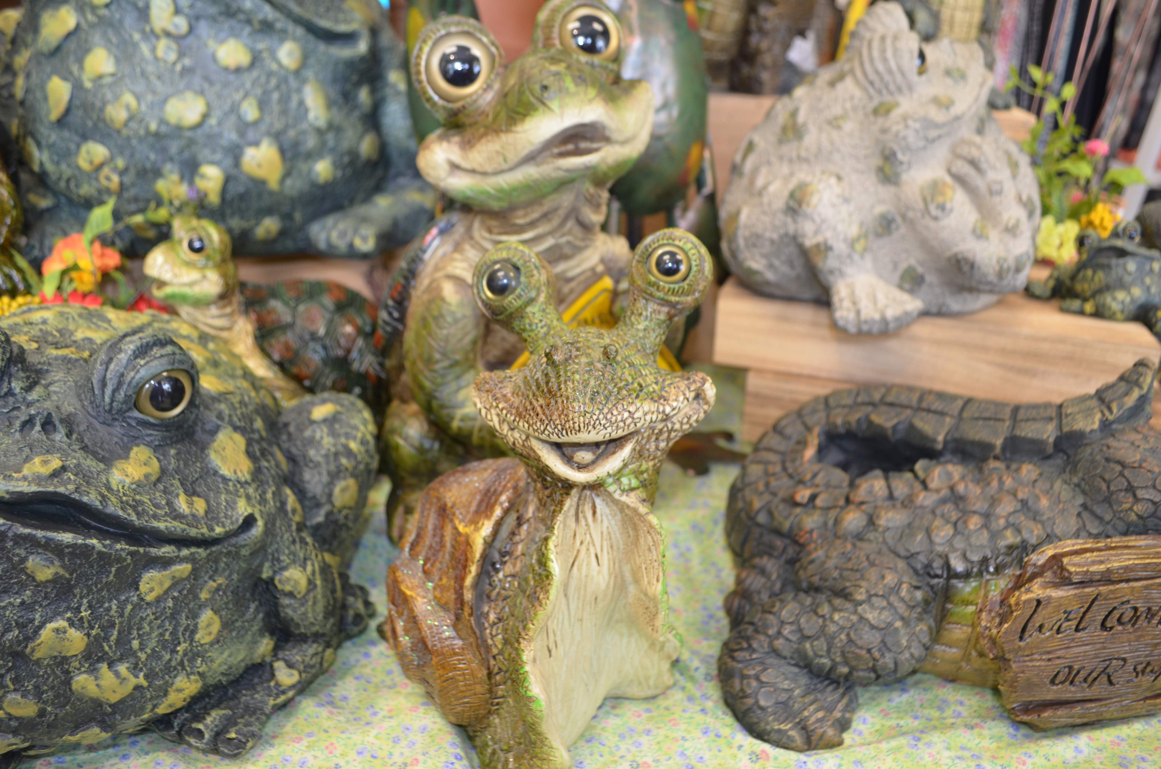 Adorn your garden with charming frog and turtle figurines, adding a touch of whimsical sophistication to your outdoor space. These fun and colorful garden accents are perfect for gardening and landscaping enthusiasts in Florida, USA.