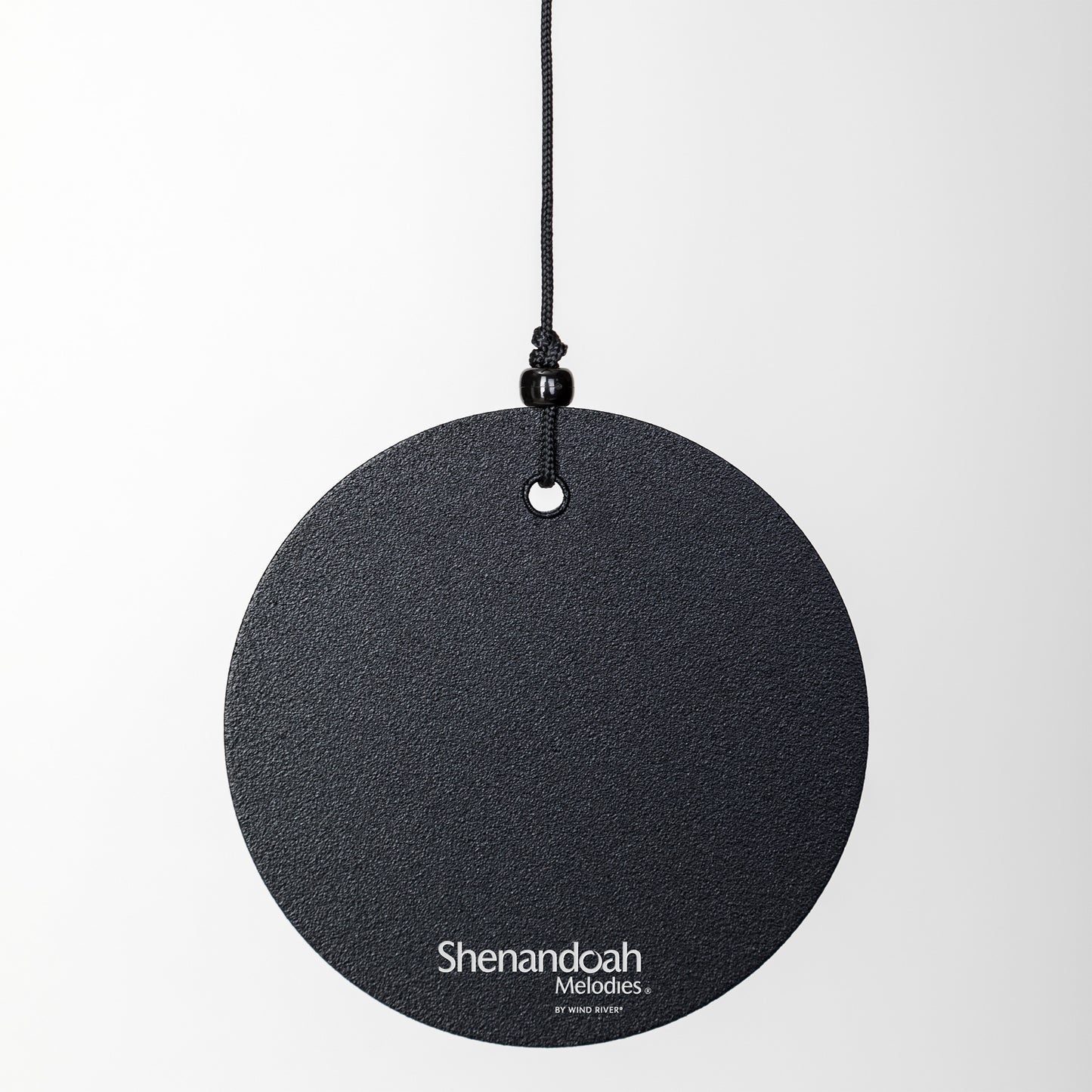 These Black Wind River Shenandoah Melodies wind chimes from Home and Garden Treasures are crafted with six hollow tubes of varying sizes suspended from a central ring, creating enchanting melodies as they dance in the breeze. Complete with a stylish round metal sail that catches gentle winds, each Shenandoah Melodies exemplifies the calming song of the Virginia countryside. Elevate your garden retreat with the perfect gift today!
