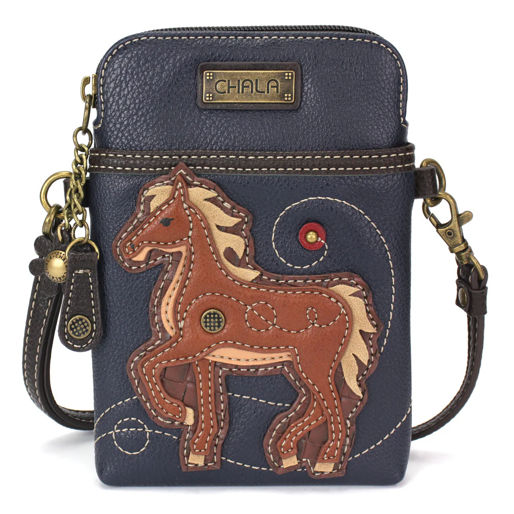 Elevate your style with the delightful Chala vegan leather crossbody handbag, featuring a whimsical Horse Chala Pal companion on the front. Crafted with cruelty-free materials, this charming accessory blends fashion with personality, making a statement that is both playful and environmentally conscious. Experience the perfect blend of whimsy and elegance with every wear, showcasing your unique flair wherever you go.