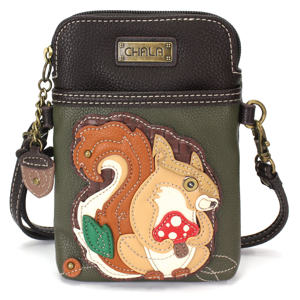 Elevate your style with the delightful Chala vegan leather crossbody handbag, featuring a whimsical Squirrel Chala Pal companion on the front. Crafted with cruelty-free materials, this charming accessory blends fashion with personality, making a statement that is both playful and environmentally conscious. Experience the perfect blend of whimsy and elegance with every wear, showcasing your unique flair wherever you go.