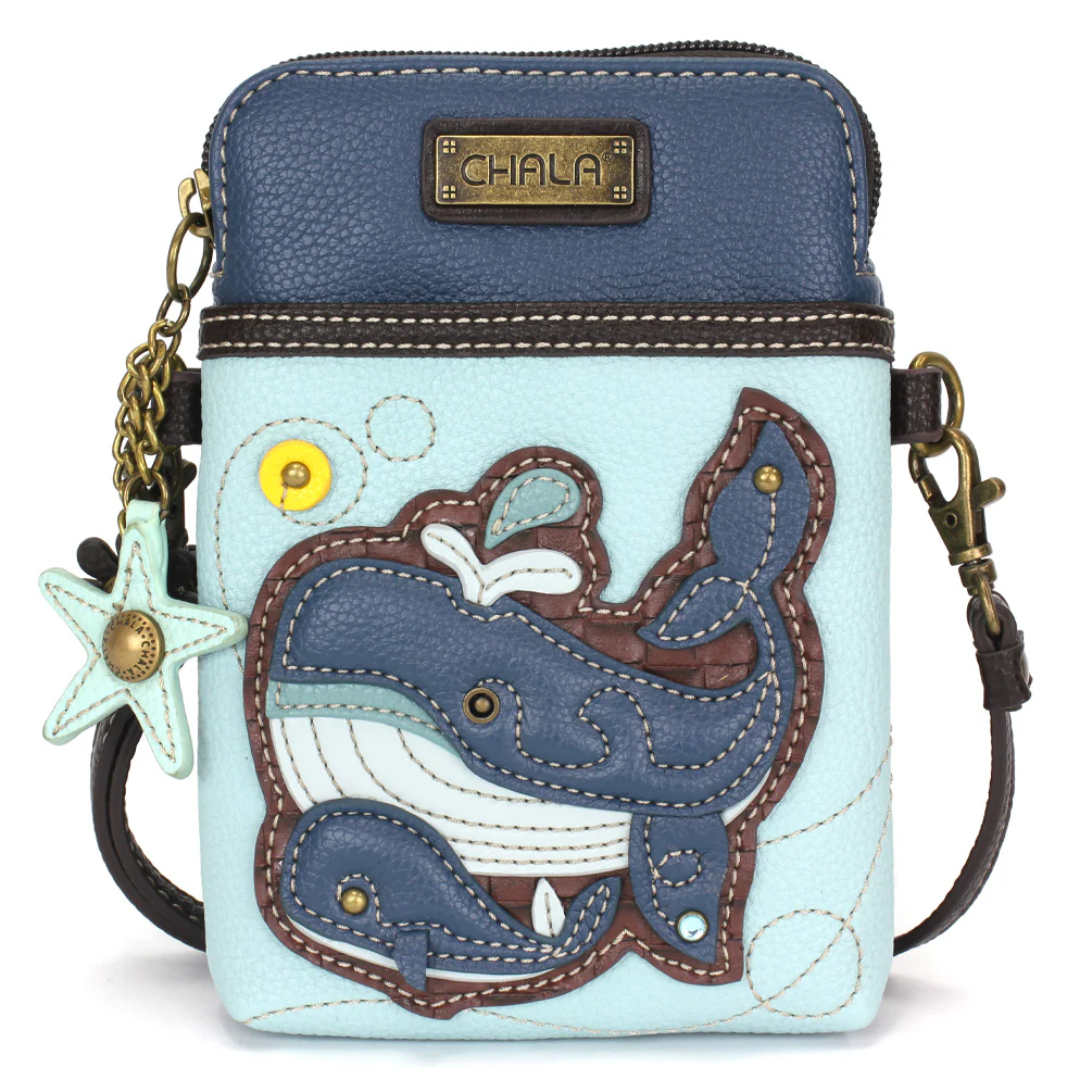 Elevate your style with the delightful Chala vegan leather crossbody handbag, featuring a whimsical Whale Family Chala Pal companion on the front. Crafted with cruelty-free materials, this charming accessory blends fashion with personality, making a statement that is both playful and environmentally conscious. Experience the perfect blend of whimsy and elegance with every wear, showcasing your unique flair wherever you go.