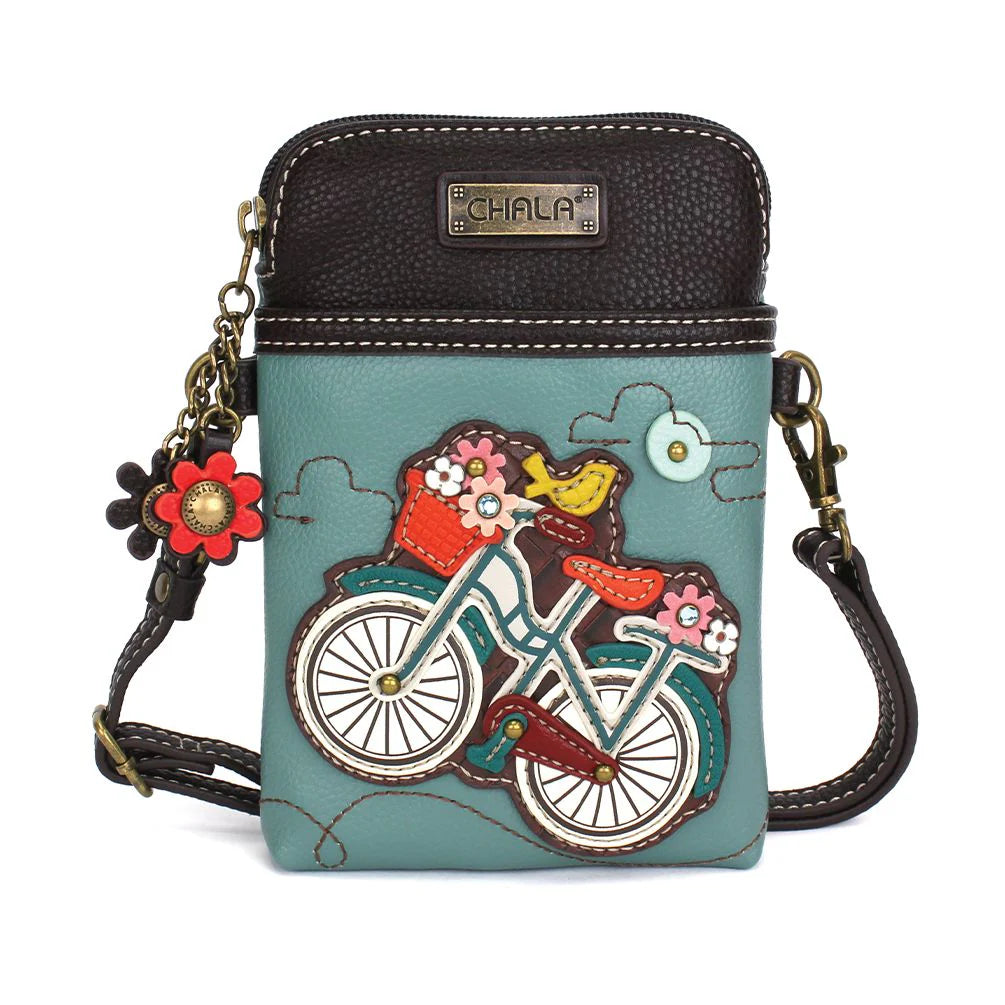 Elevate your style with the delightful Chala vegan leather crossbody handbag, featuring a whimsical Bicycle Chala Pal companion on the front. Crafted with cruelty-free materials, this charming accessory blends fashion with personality, making a statement that is both playful and environmentally conscious. Experience the perfect blend of whimsy and elegance with every wear, showcasing your unique flair wherever you go.