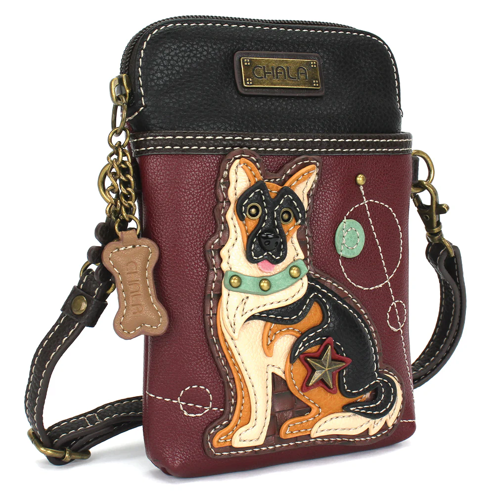 Elevate your style with the delightful Chala vegan leather crossbody handbag, featuring a whimsical German Shepherd Dog Chala Pal companion on the front. Crafted with cruelty-free materials, this charming accessory blends fashion with personality, making a statement that is both playful and environmentally conscious. Experience the perfect blend of whimsy and elegance with every wear, showcasing your unique flair wherever you go.
