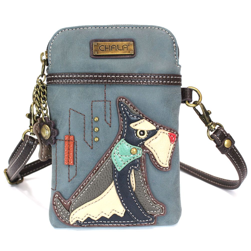 Elevate your style with the delightful Chala vegan leather crossbody handbag, featuring a whimsical Schnauzer Dog Chala Pal companion on the front. Crafted with cruelty-free materials, this charming accessory blends fashion with personality, making a statement that is both playful and environmentally conscious. Experience the perfect blend of whimsy and elegance with every wear, showcasing your unique flair wherever you go.