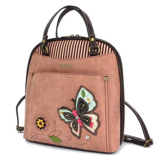 Elevate your style with the delightful Chala vegan leather convertible backpack purse, featuring a butterfly Chala Pal companion on the front. Crafted with cruelty-free materials, this charming accessory blends fashion with personality, making a statement that is both playful and environmentally conscious. Experience the perfect blend of whimsy and elegance with every wear, showcasing your unique flair wherever you go